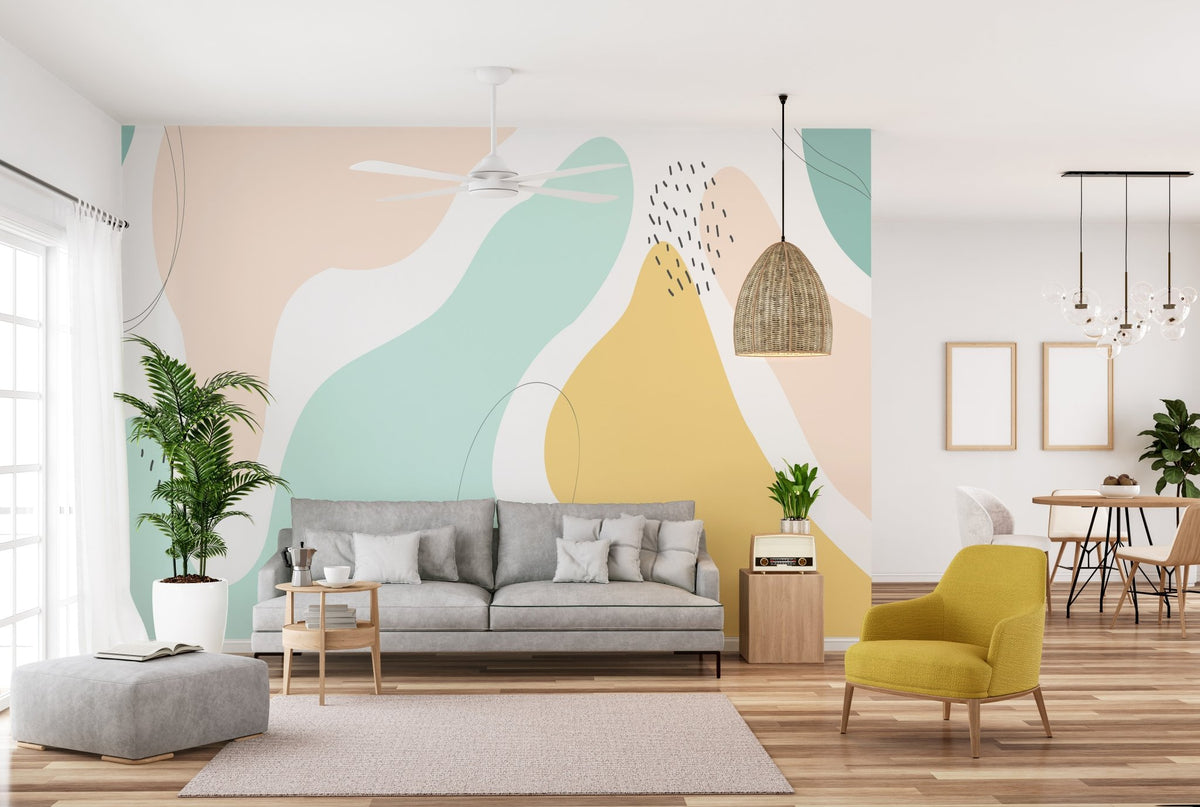 Multi-color harmony pattern wall mural in a living room with a grey sofa and yellow chair.