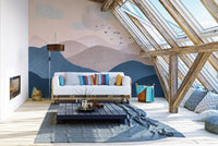 Pastel mountain wall mural featuring soft, calming tones in attic living space.
