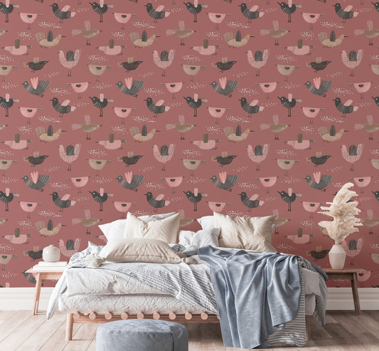 Pastel wallpaper featuring hand-drawn birds on dark pink in bedroom.