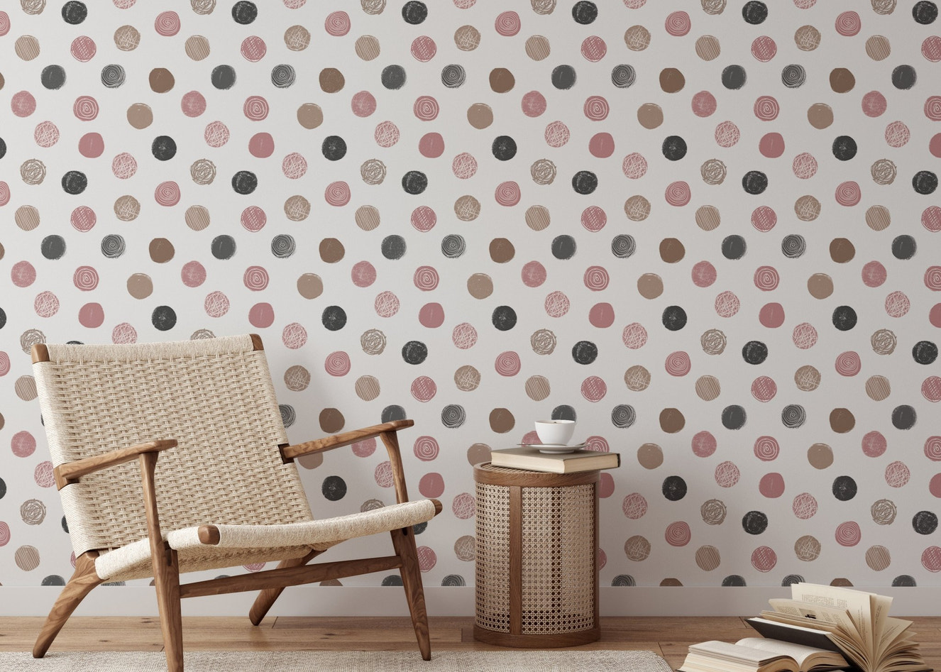 Neutral nursery featuring a polka dot wallpaper and light wood furniture.