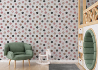 Playroom decor featuring a multi-color polka dot wallpaper.