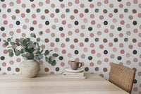 Minimalist dining room with a white sofa and circular pattern wallpaper.