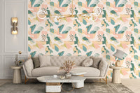 Floral pattern wallpaper in a lounge with a beige tufted couch.