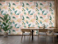 Floral and geometric pattern wallpaper behind a dining table and wooden chairs.