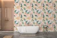 Pastel seamless pattern wallpaper behind a white bathtub in a bathroom.