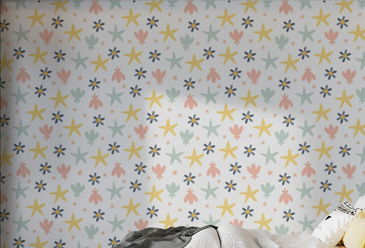 Pastel Starfish Wallpaper for kids bedroom in pink, yellow and blue.