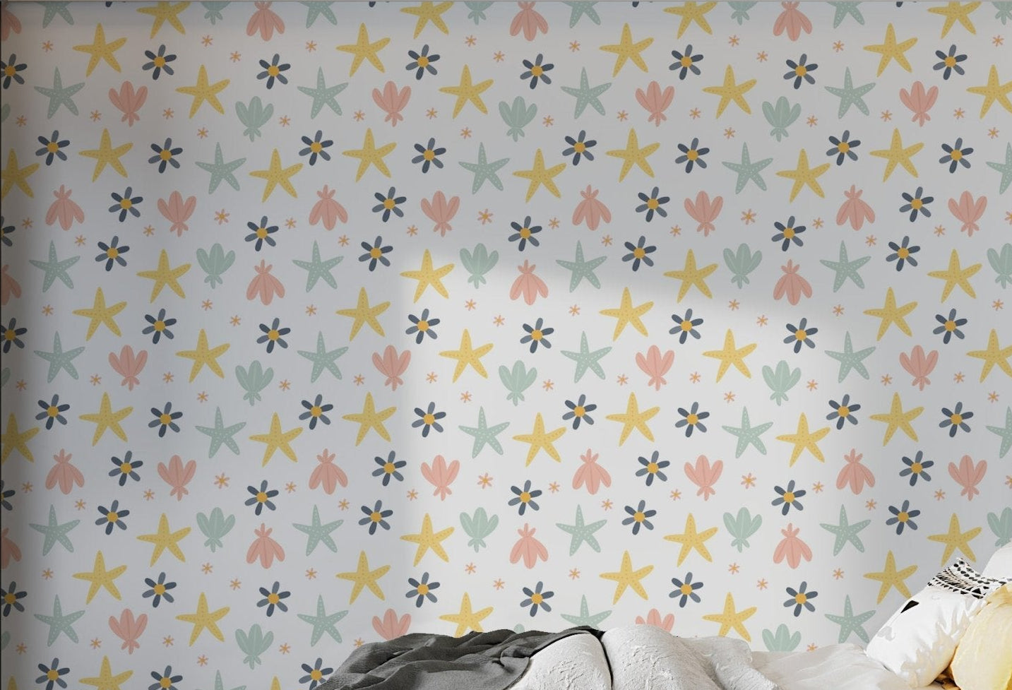 Pastel Starfish Wallpaper for kids bedroom in pink, yellow and blue.