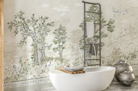 Pastel tree canopy wall murals in a bathroom with a white freestanding tub.