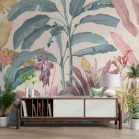 Tropical botanical leaves wall mural featuring soft pink and cream tones