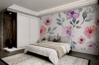 Feminine untamed flower print wallpaper in peach tones.