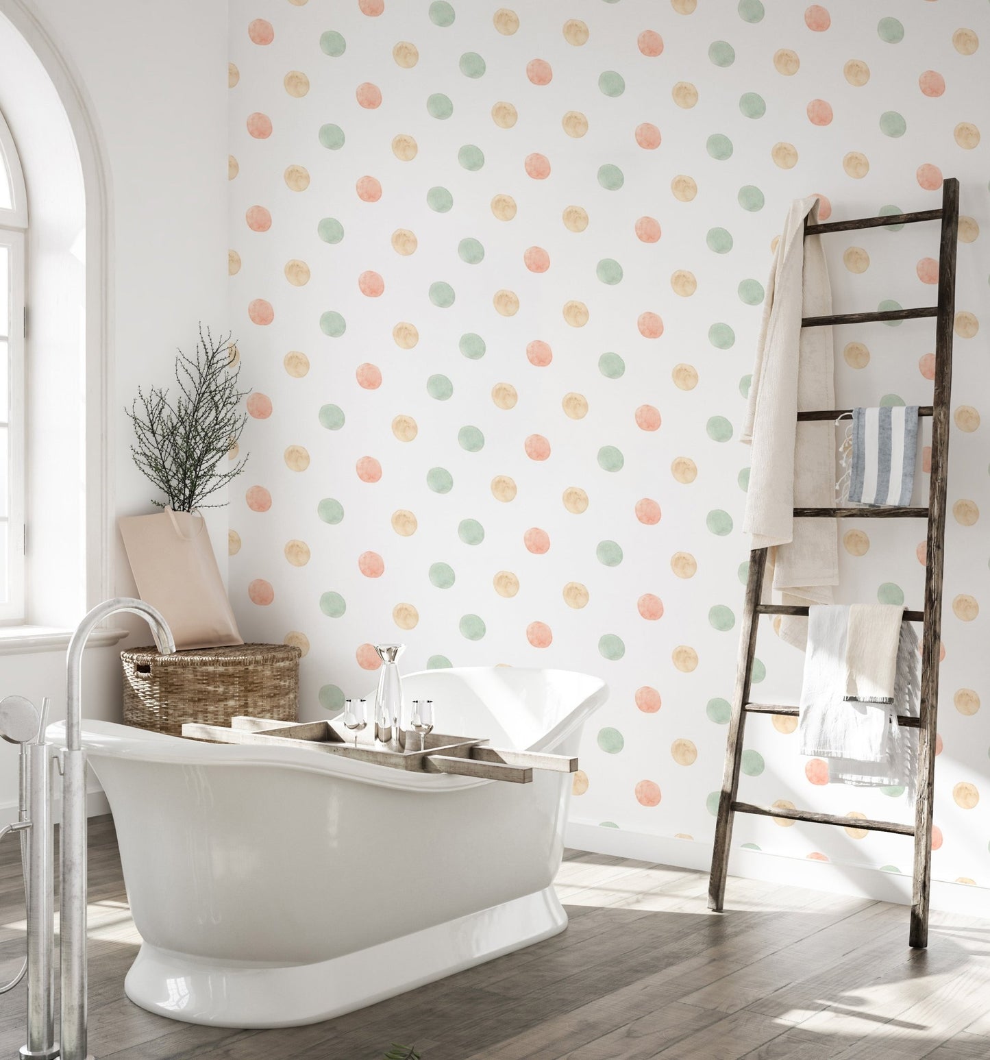 Bathroom interior with white tub and pastel watercolor polka dots wallpaper.