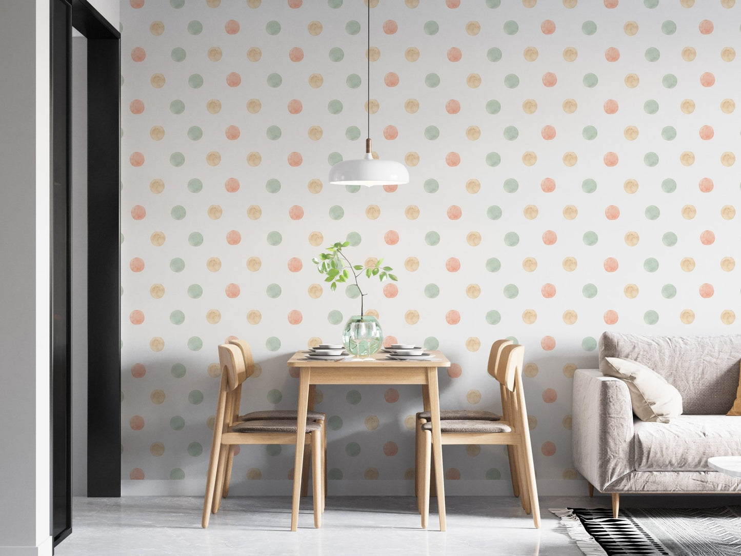 Modern dining area featuring pastel watercolor polka dots wallpaper behind a table.
