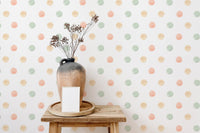 Minimalist decor with pastel watercolor polka dots isolated white wallpaper and dried flowers.