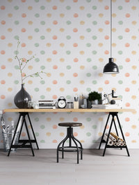 Home office wallpaper with watercolor circles and a black industrial desk.