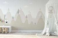 Pine tree mountain wall mural in a bright room with a white canopy.