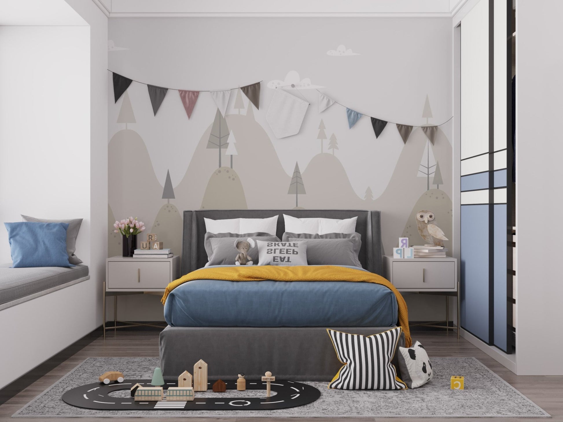 Minimalist mountain peaks wall mural in a child's bedroom with a white dresser.