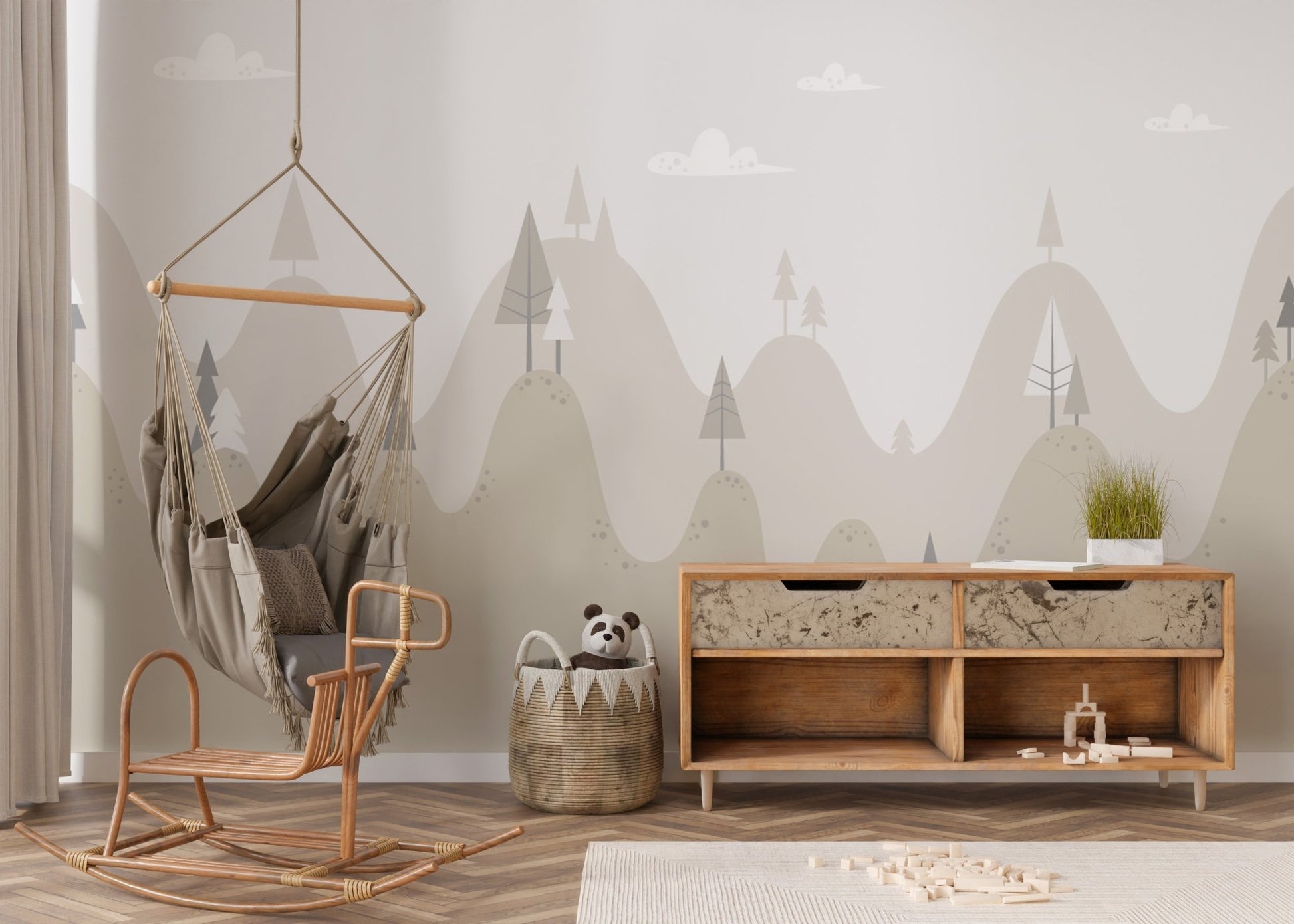 Minimalist mountain retreat wall mural near a hanging wicker chair.