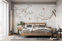 Contemporary blossom branch wall mural wallpaper in muted shades.