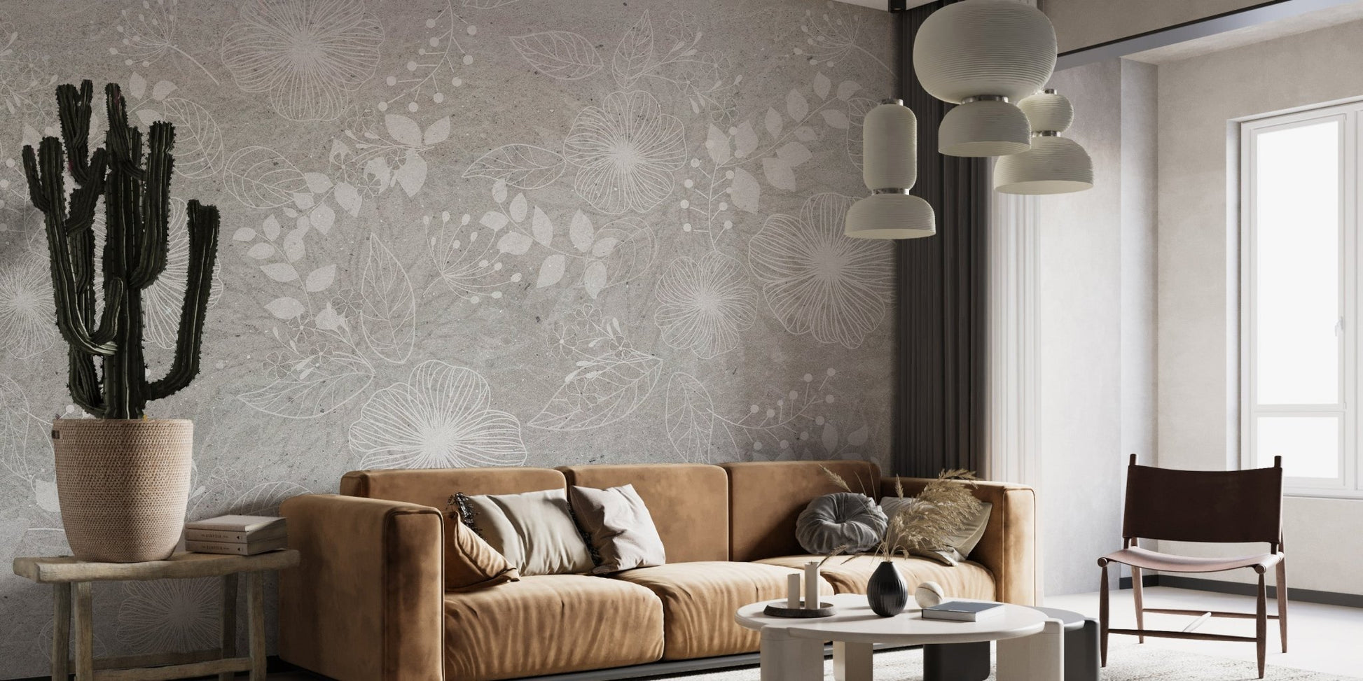 Minimalist flower wall mural in a living space featuring a tan sofa and cactus plant.