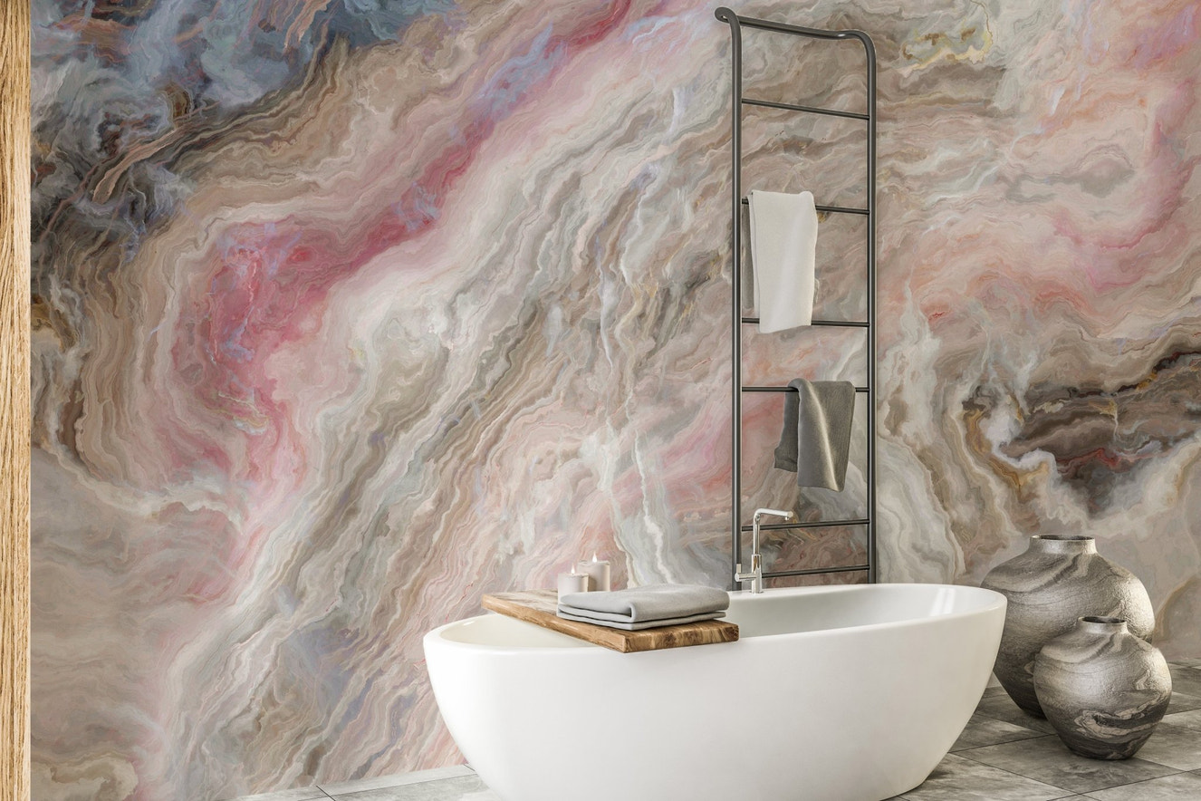 Beige color marble wall murals in a bathroom with a white freestanding tub.