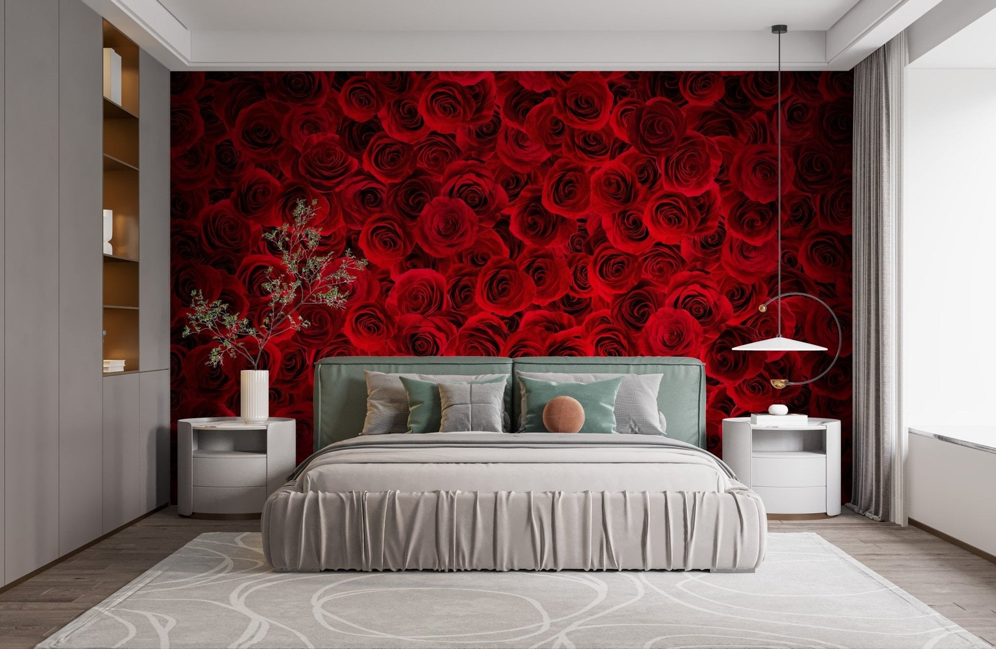 Red rose bouquet wallpaper mural in a modern bedroom with a green bed frame.