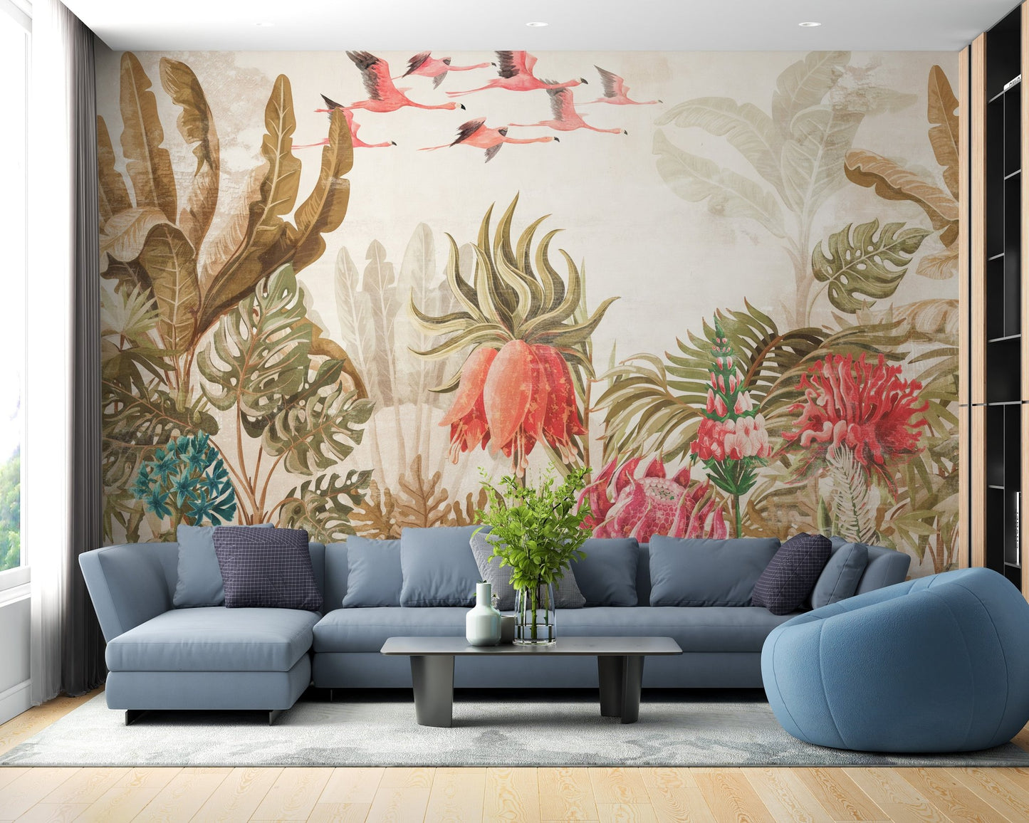 Blue l-shaped sofa set against a Havana art wall mural in living room.