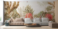 Large scale floral art wall mural behind a grey sectional sofa.