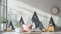Scandi style wall mural with triangle shapes in a spacious toddler room.