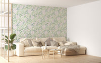 Large sofa in a bright living area with Pink and Green Color Leaves Repeat Pattern Wallpaper.