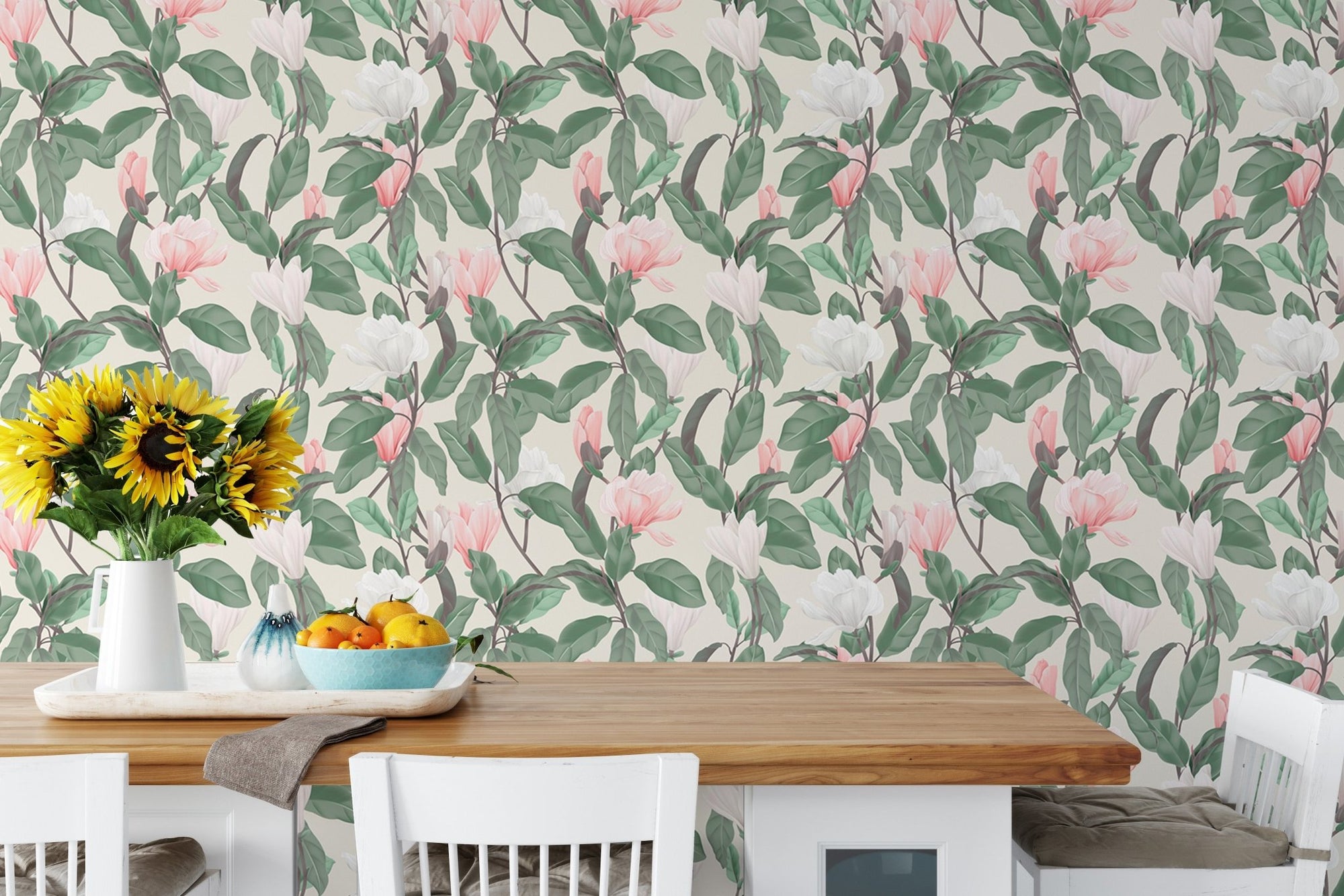 Pink and White Anise Magnolia Flowers Leaves Wallpaper behind a wooden dining table