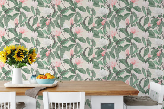 Pink and White Anise Magnolia Flowers Leaves Wallpaper behind a wooden dining table