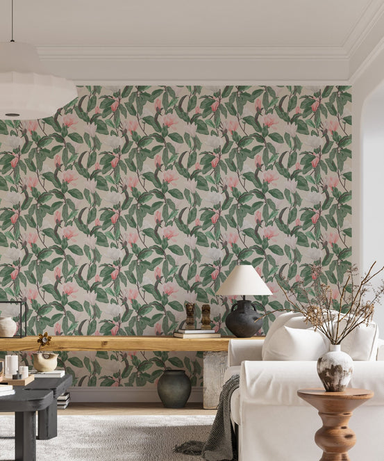 Botanical leaves wallpaper in a living room with a white sofa and wooden bench