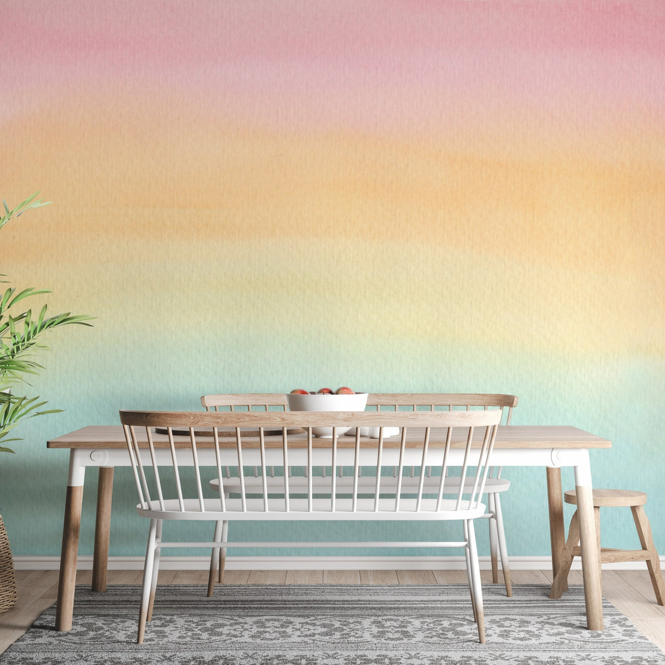Watercolor wall mural with pink and blue gradient in a dining area.