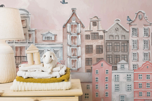 Watercolor city skyline wall mural in blush pink color.