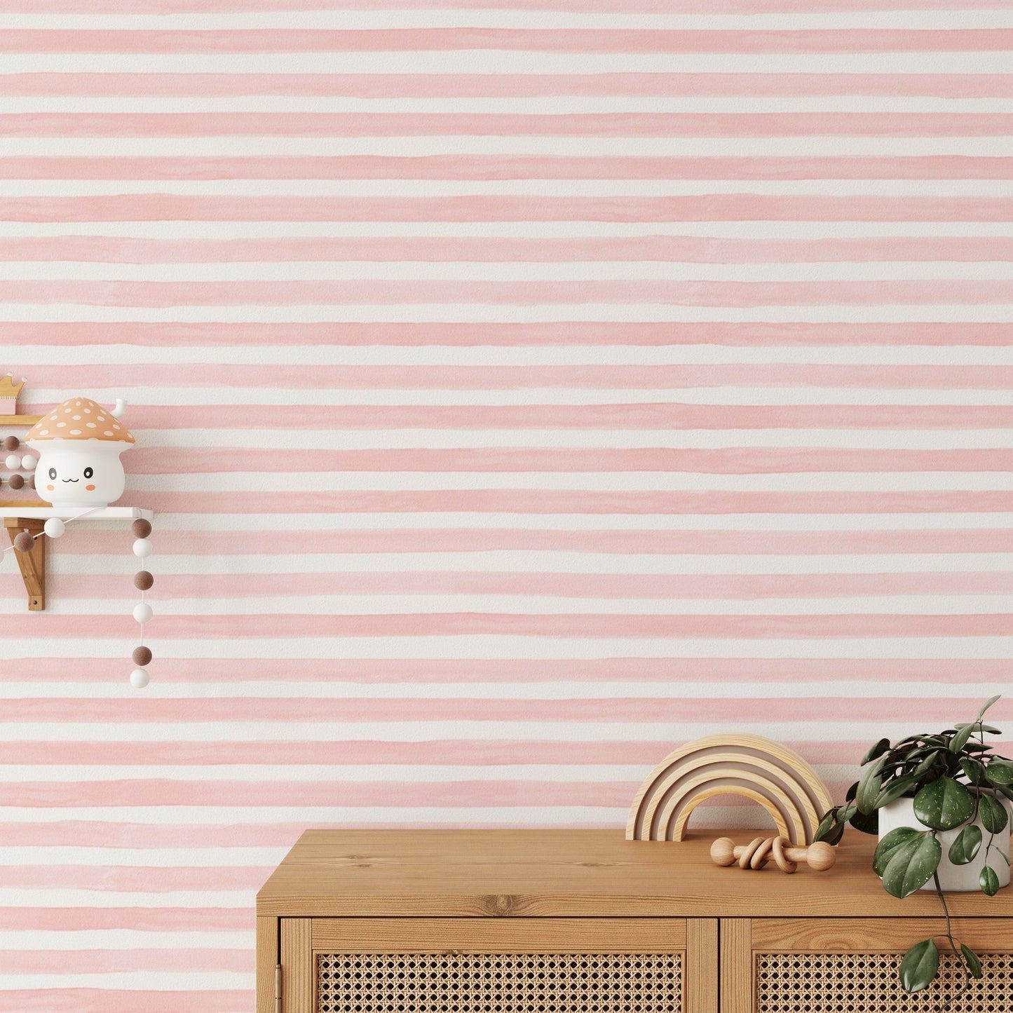 Pink horizontal stripe wallpaper in a kids play area with wooden toys.