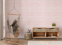 Pink Color Abstract Stripe Watercolor Wallpaper in a living with a hanging chair.