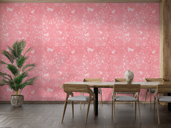 Large dining room wallpaper with pink chinoiserie tree and bird patterns.
