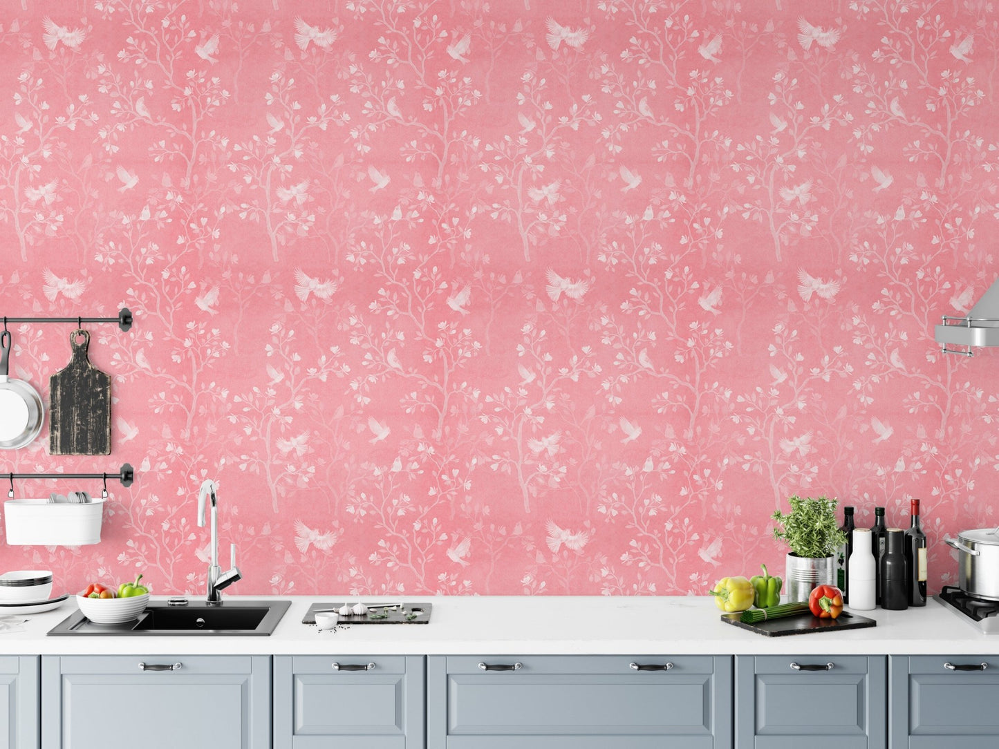 Kitchen backsplash area styled with pink magnolia tree and birds wallpaper.