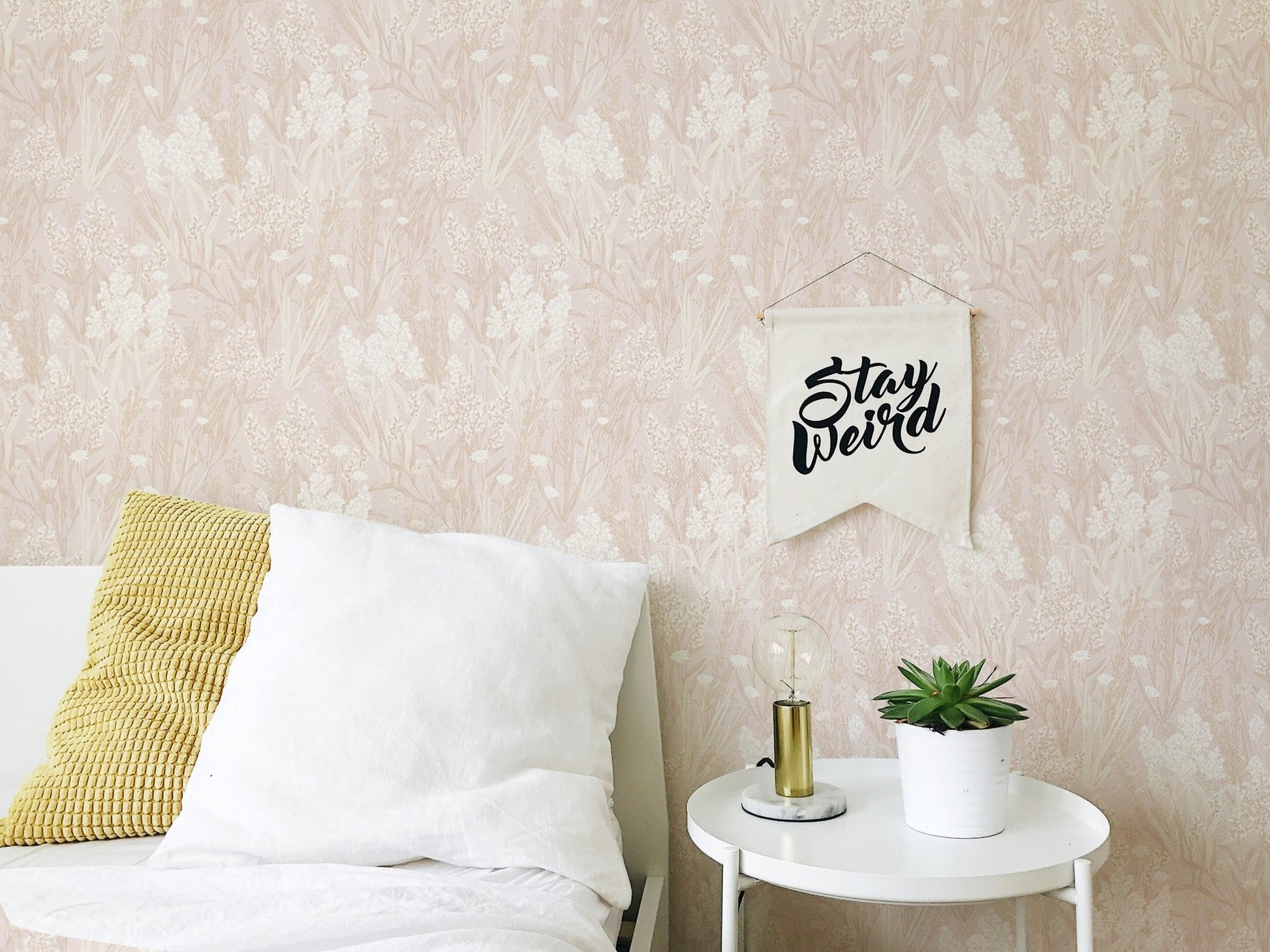 Pink Color Nostalgic Botanical Leaf Pattern Wallpaper behind a bed in bedroom.