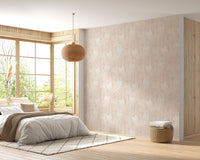 Large botanical wallpaper in a sunlit bedroom with a floor lamp