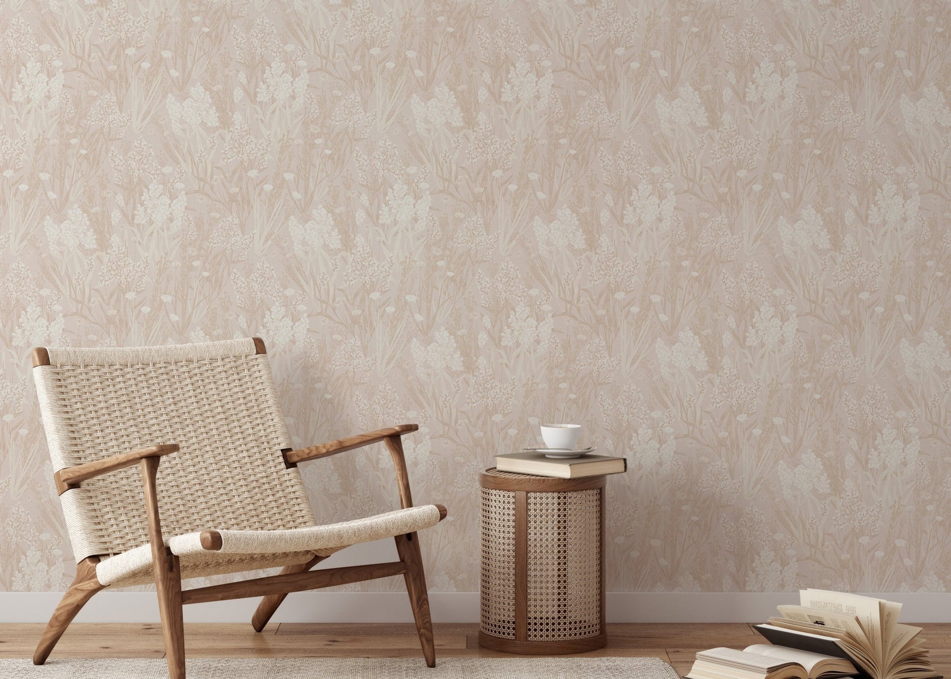 Pink wallpaper with leaf motifs in a sitting room with a woven chair