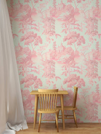 Pink Color Toile Tropical Wallpaper in small dining area with wooden chairs