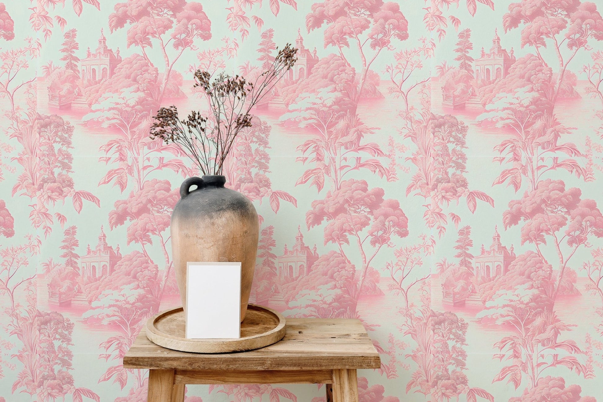 Floral pink wallpaper on feature wall with rustic wooden stool.