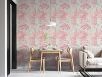 Pink leaf wallpaper in spacious dining room with grey sofa