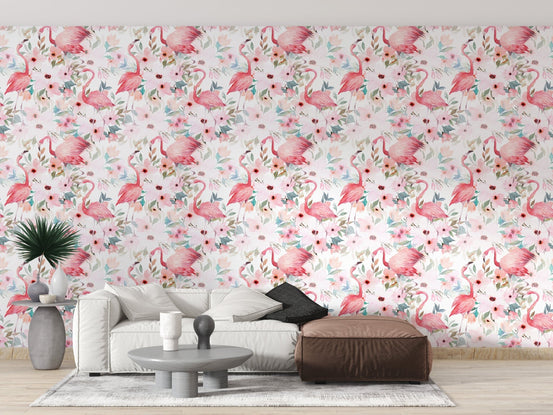 Nature-inspired Pink Flamingo Patterns wallpaper mural behind a grey fabric sofa.