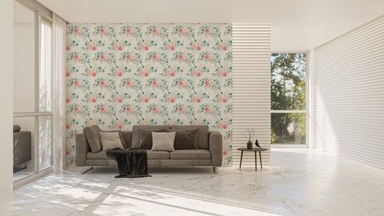 Pink floral wallpaper in a wide living room with a grey sofa.