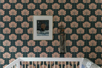 Graceful pink flowers on Victorian-style wallpaper