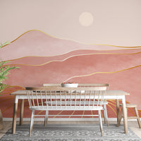 Abstract pink mountain wall mural in a dining area.