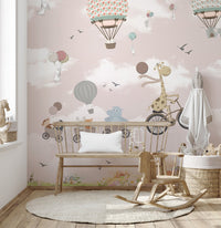 Cartoon animal wall mural with a rocking horse and wooden bench in a bright space.