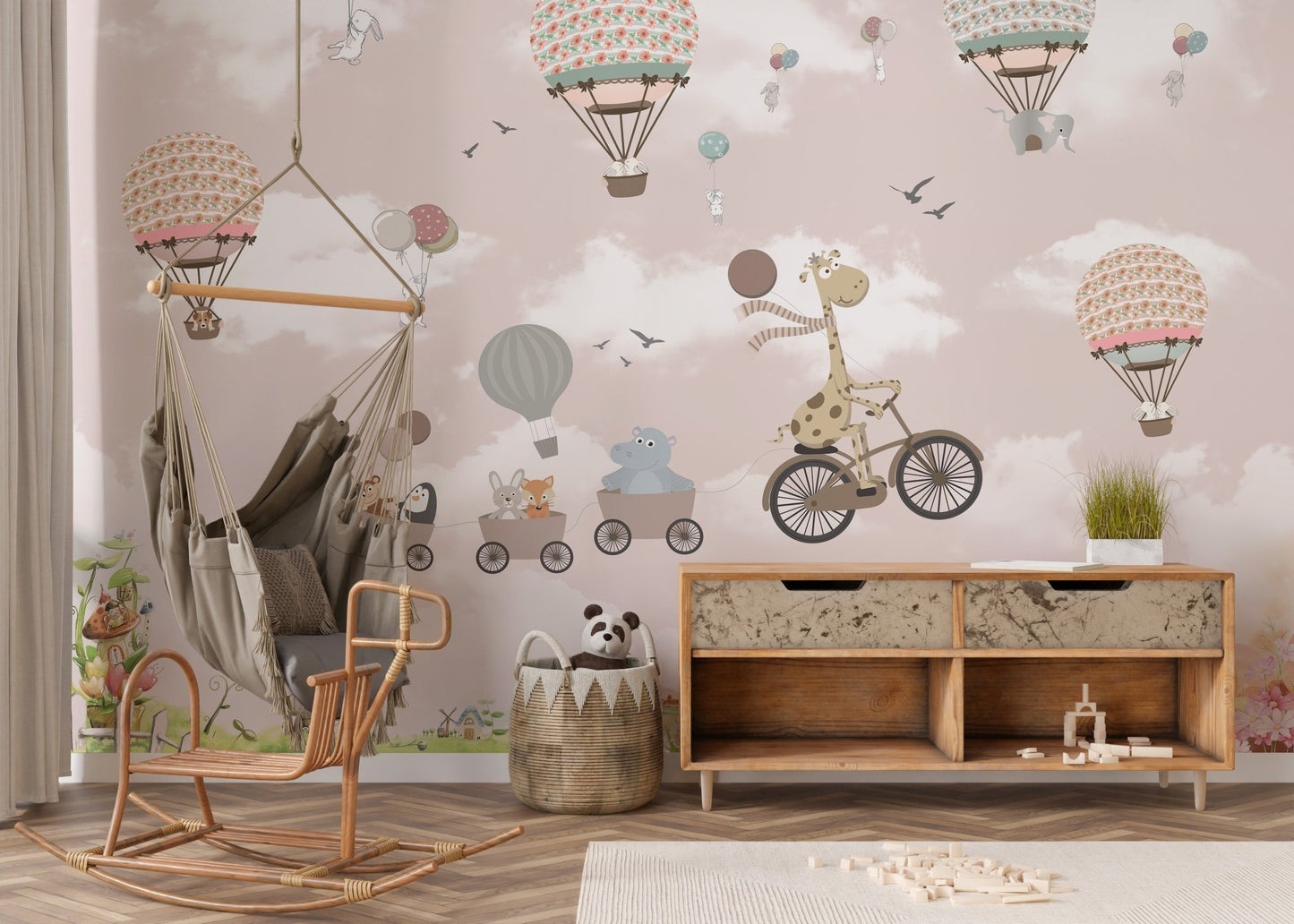 Animal themed wall mural with hot air balloons and clouds in a neutral play space.